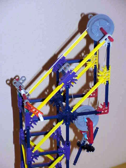 Close up of top of free pulley system with both both pulleys