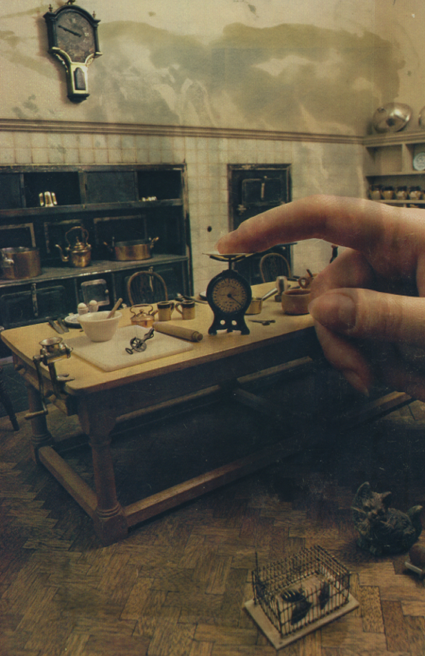 Queen Mary's dollhouse with hand